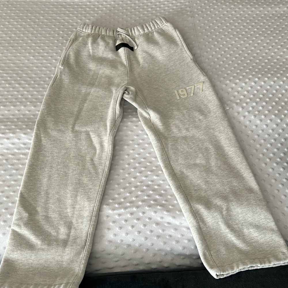 Essentials boy sweat pants look new. no stains, rips or tears great condition